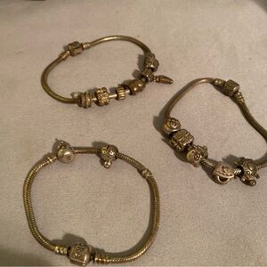Lots of pandoras 3 bracelets and 13 charms